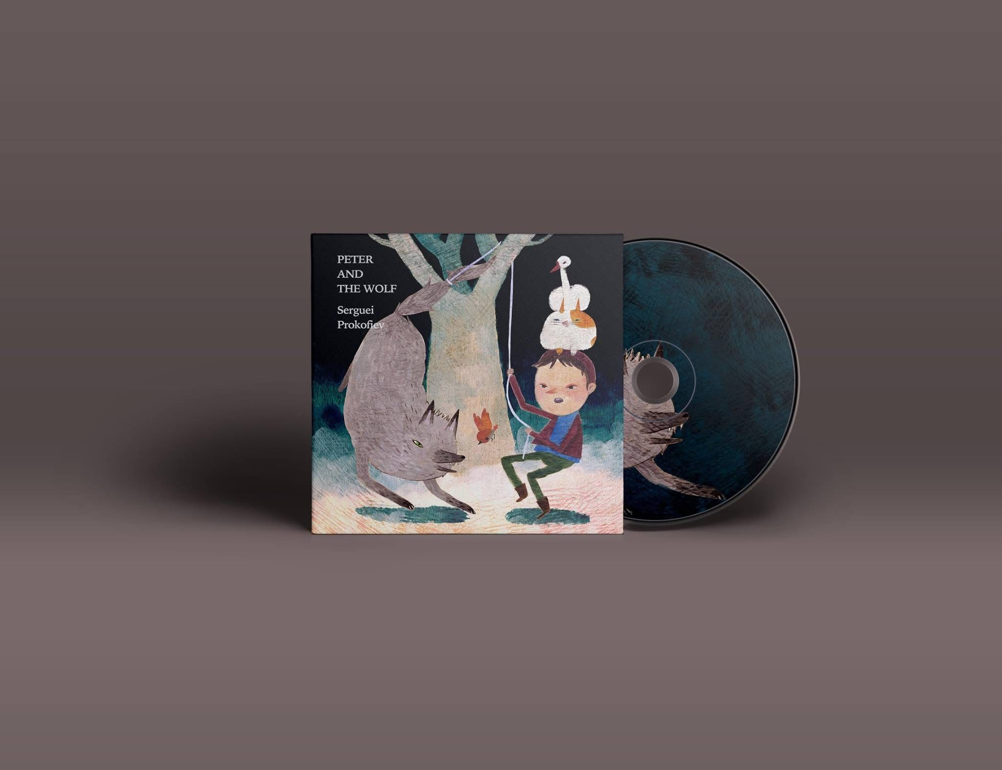 Mockup of the Peter and the Wolf sleeve beside a vinyl record